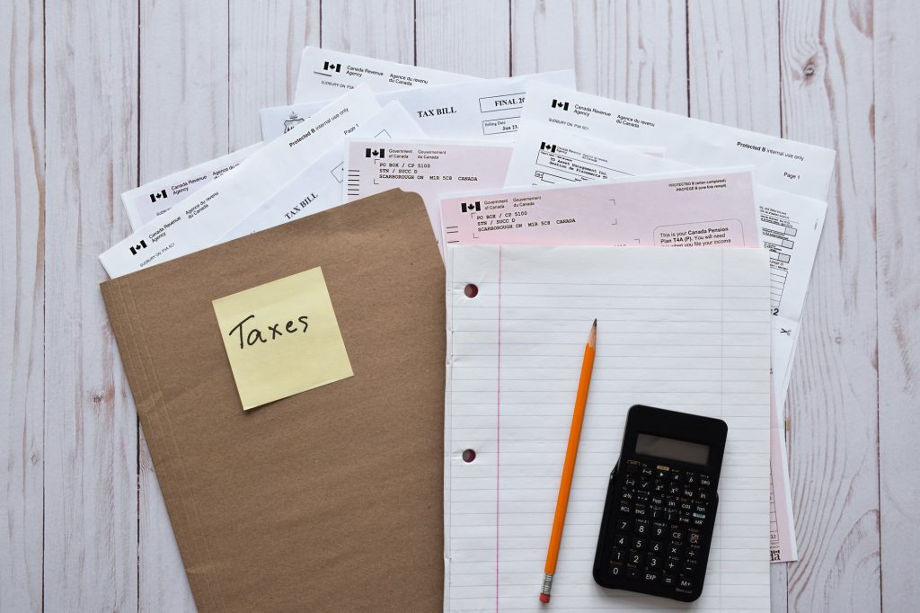 File folder with paperwork to prepare yearly taxes